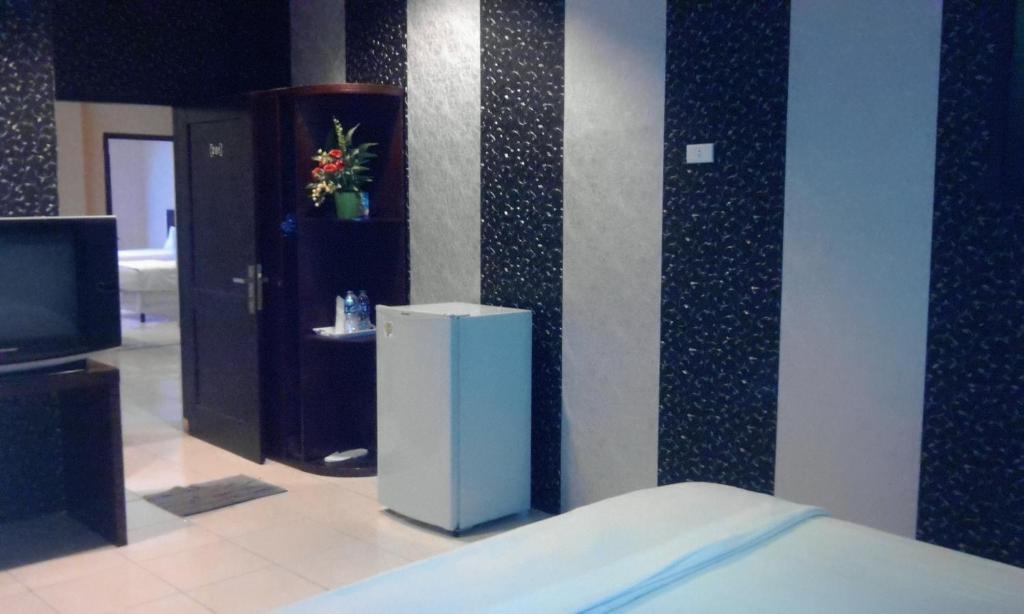 Hotel Sing A Song Пематангсіантар Номер фото